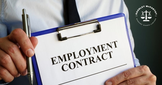 person holding employment contract